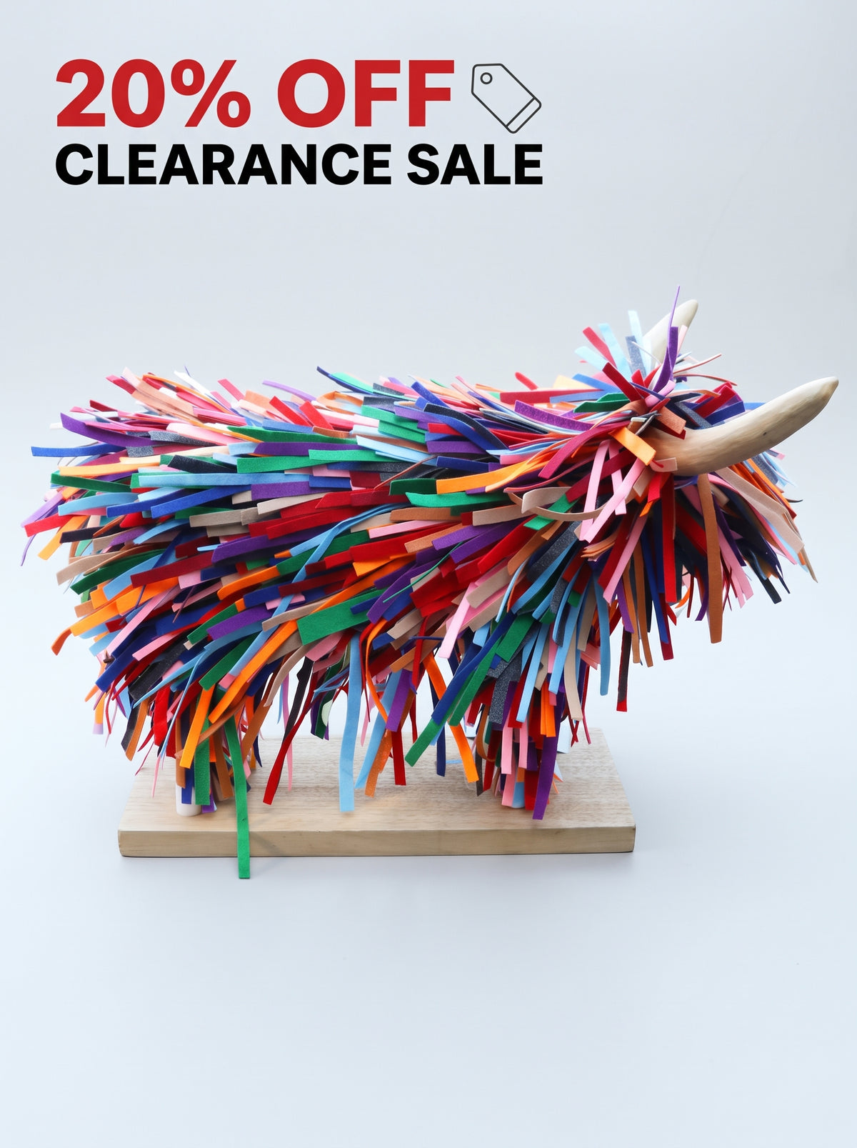 20% off clearance sale with a picture of a highland cow