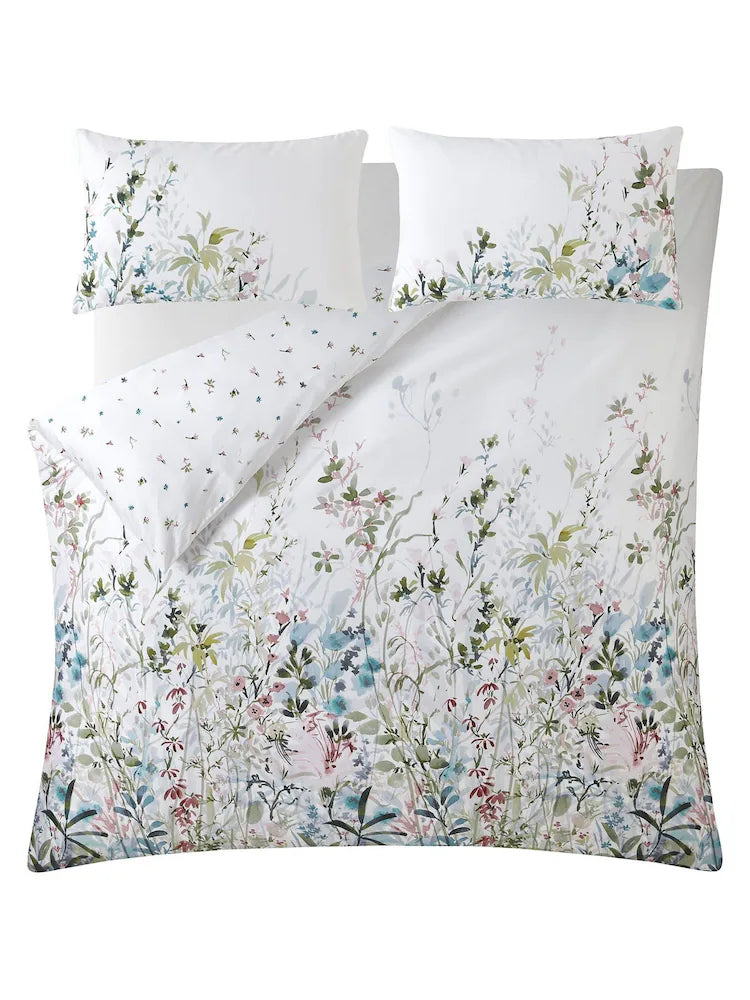 a bed with a floral design
