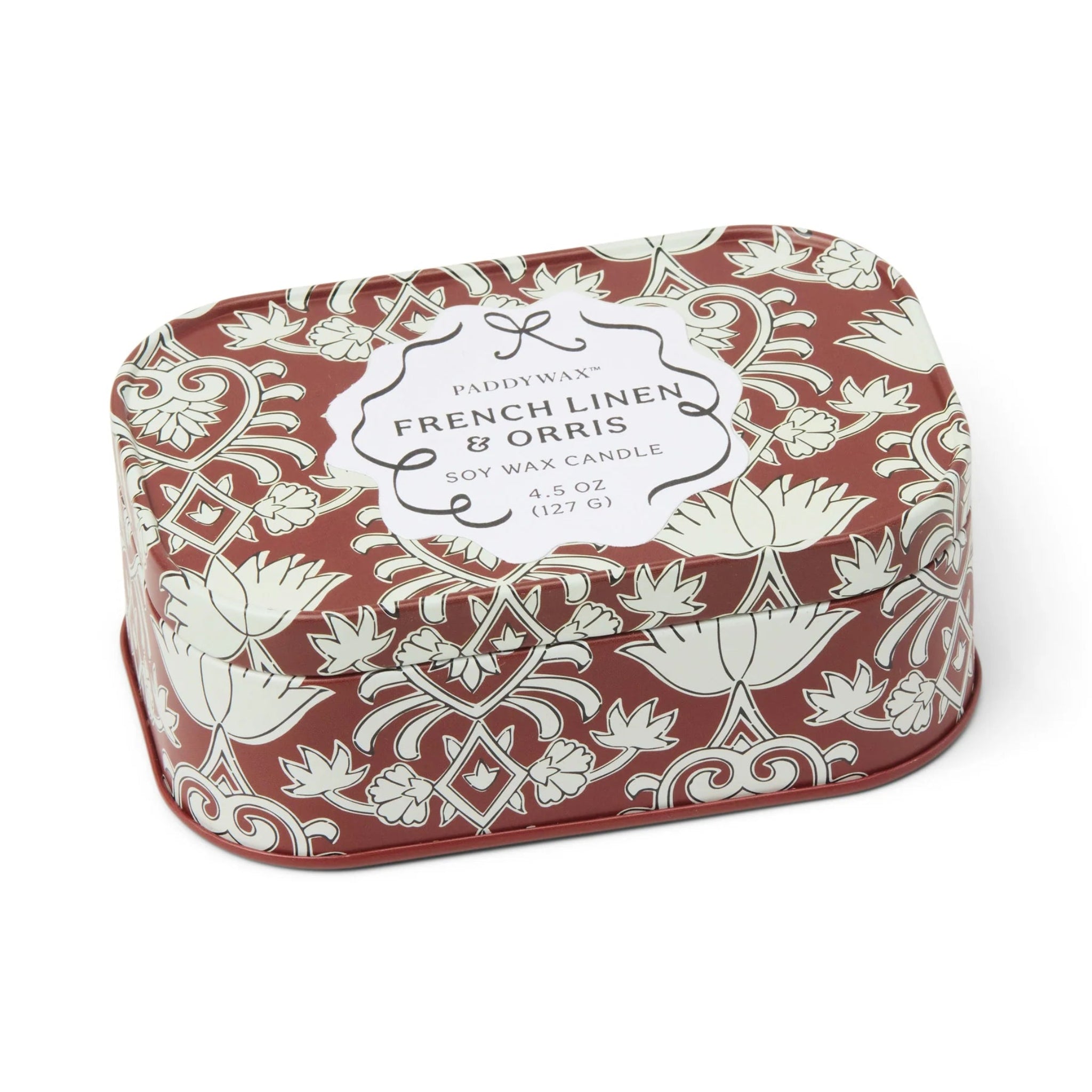 Decorative candle tin with floral pattern and &