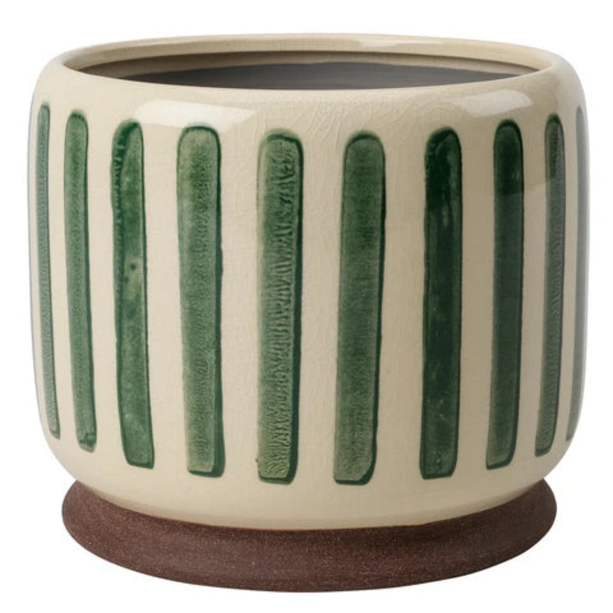 Ceramic planter with green vertical stripes on a white background