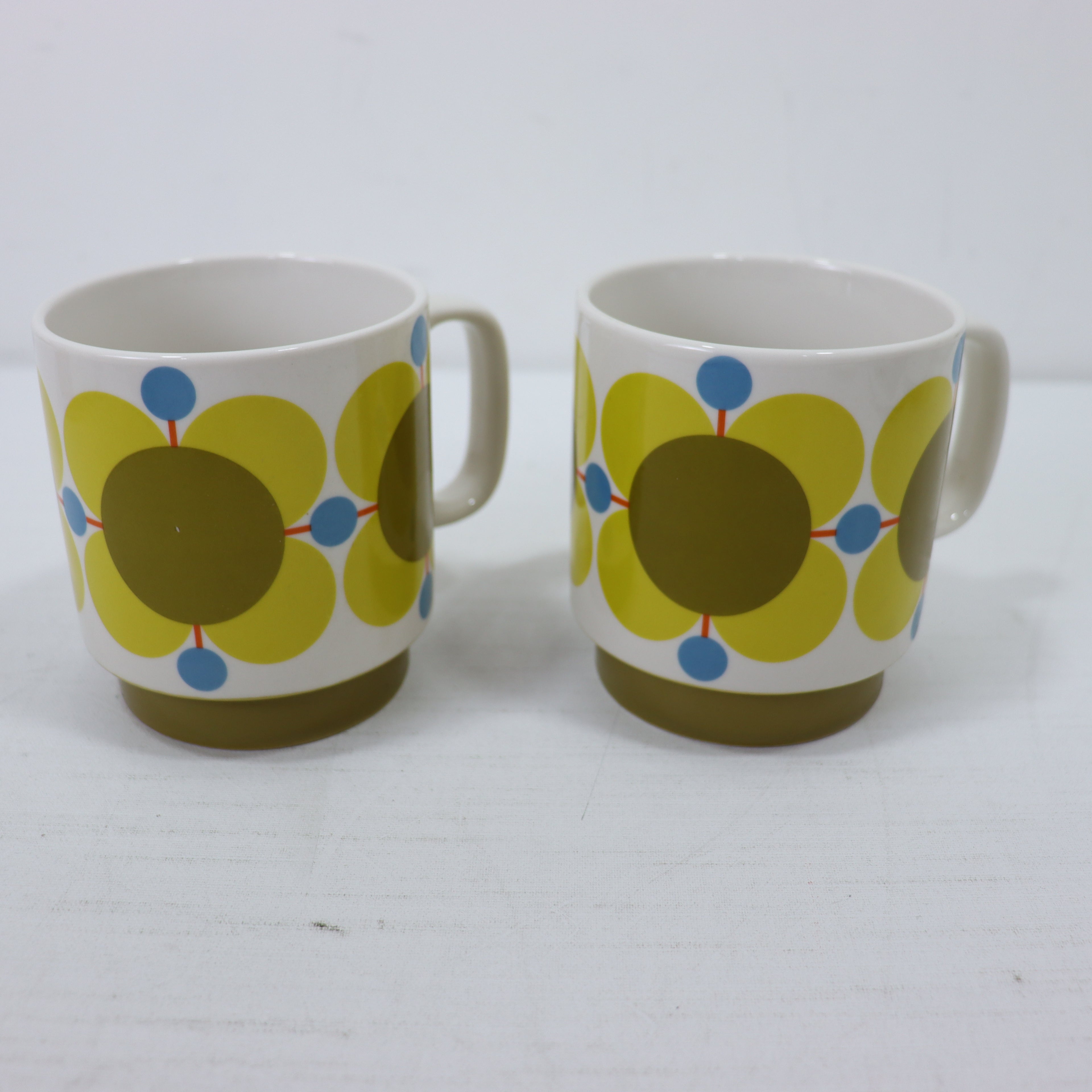 two cups with a pattern on them