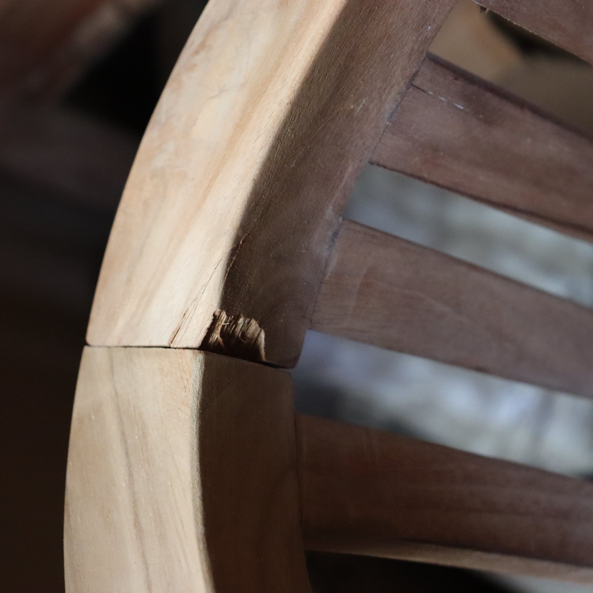 a close up of a wooden chair