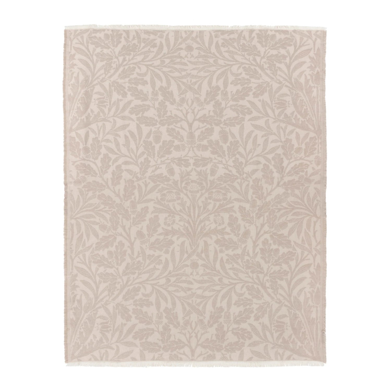 Beige area rug with subtle leaf pattern on a white background