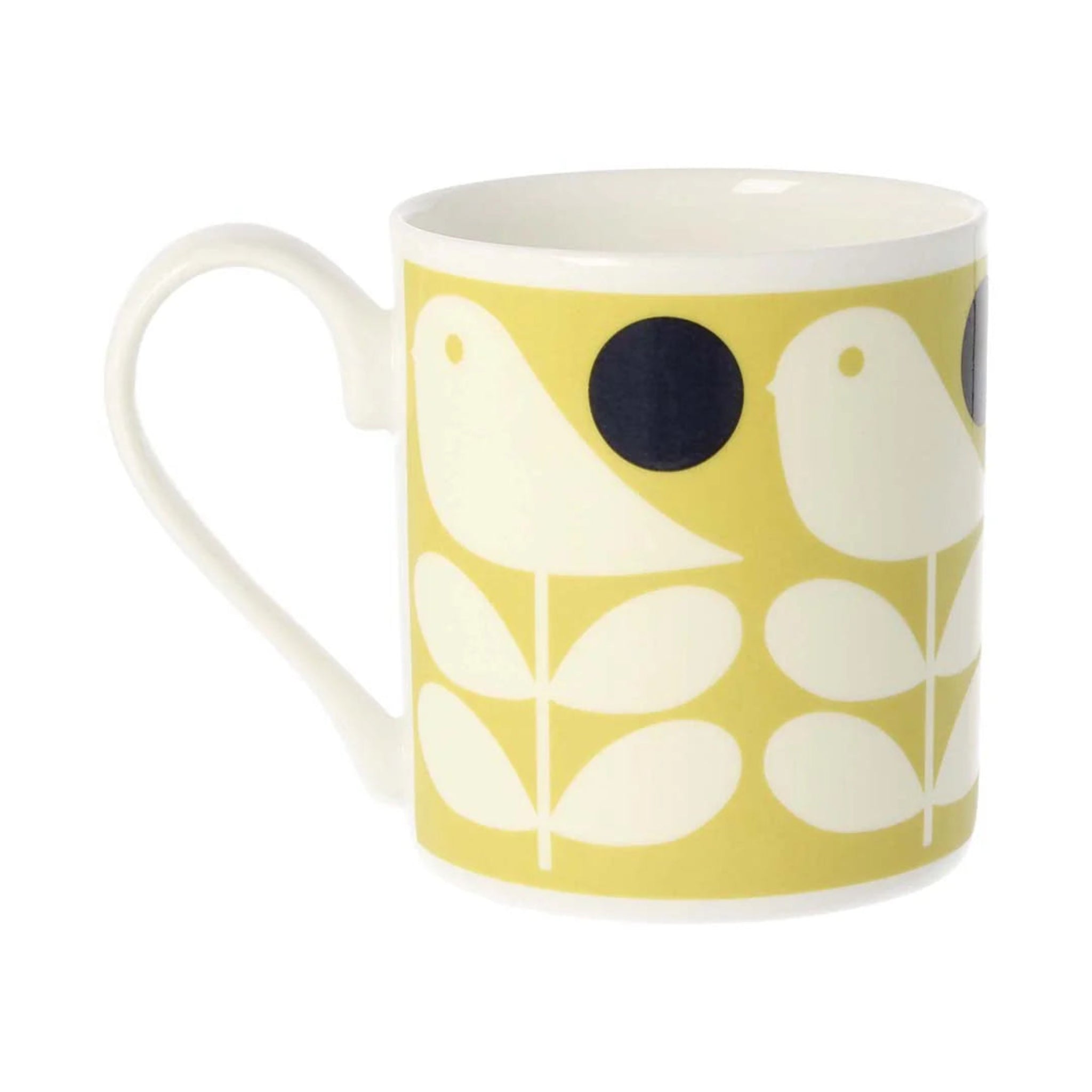 Mug with bird and leaf pattern on a yellow background