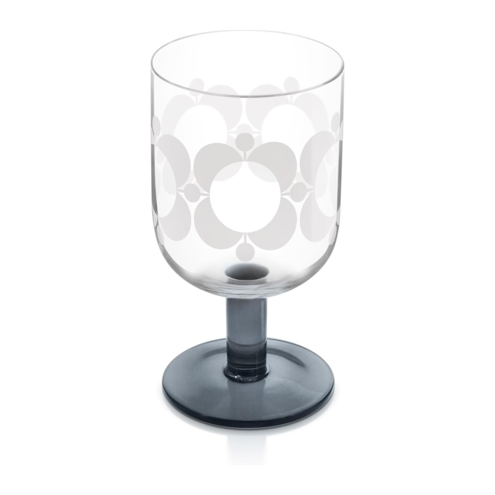 Clear glass with floral design and grey base on a white background