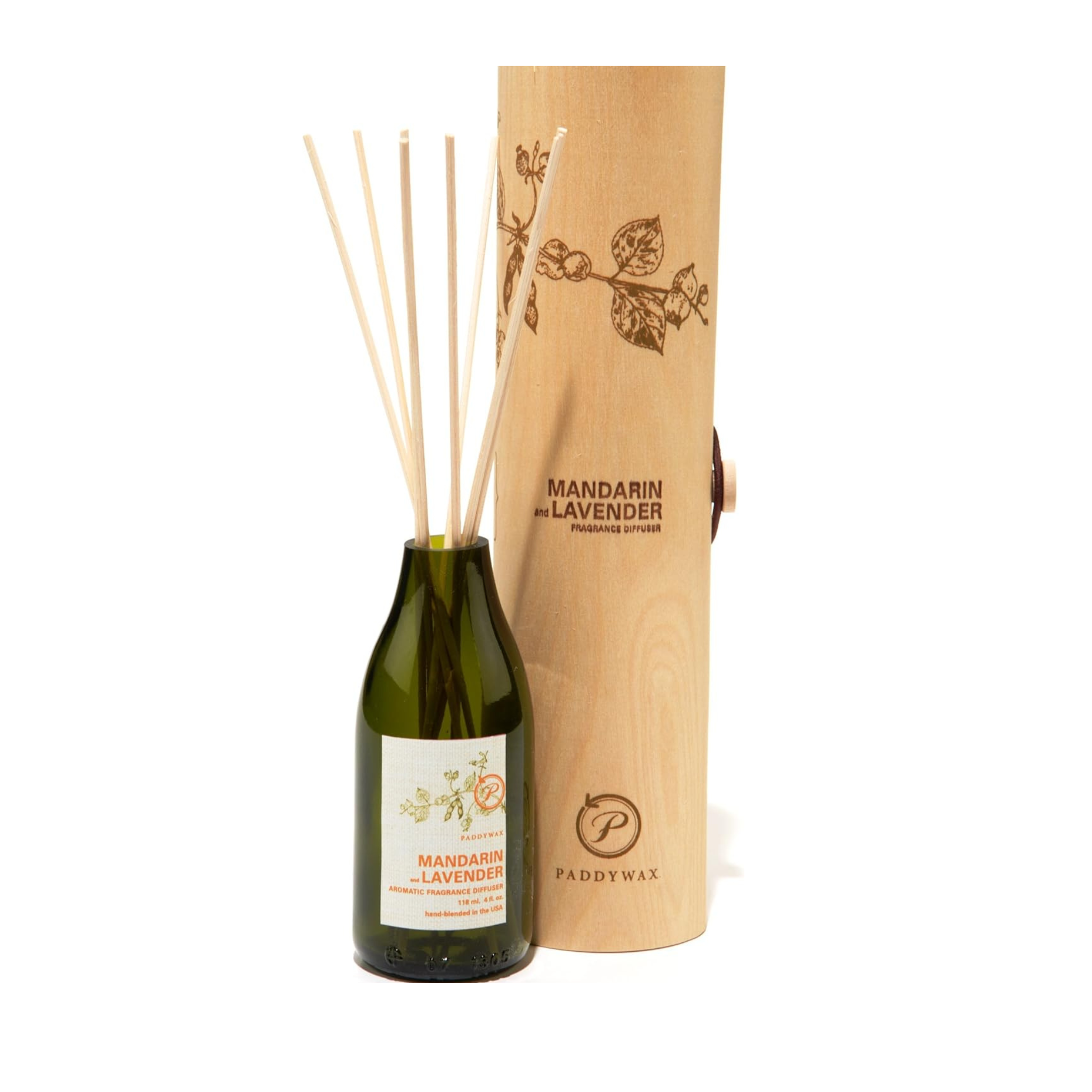 a bottle of aromatherapy sticks next to a wooden box