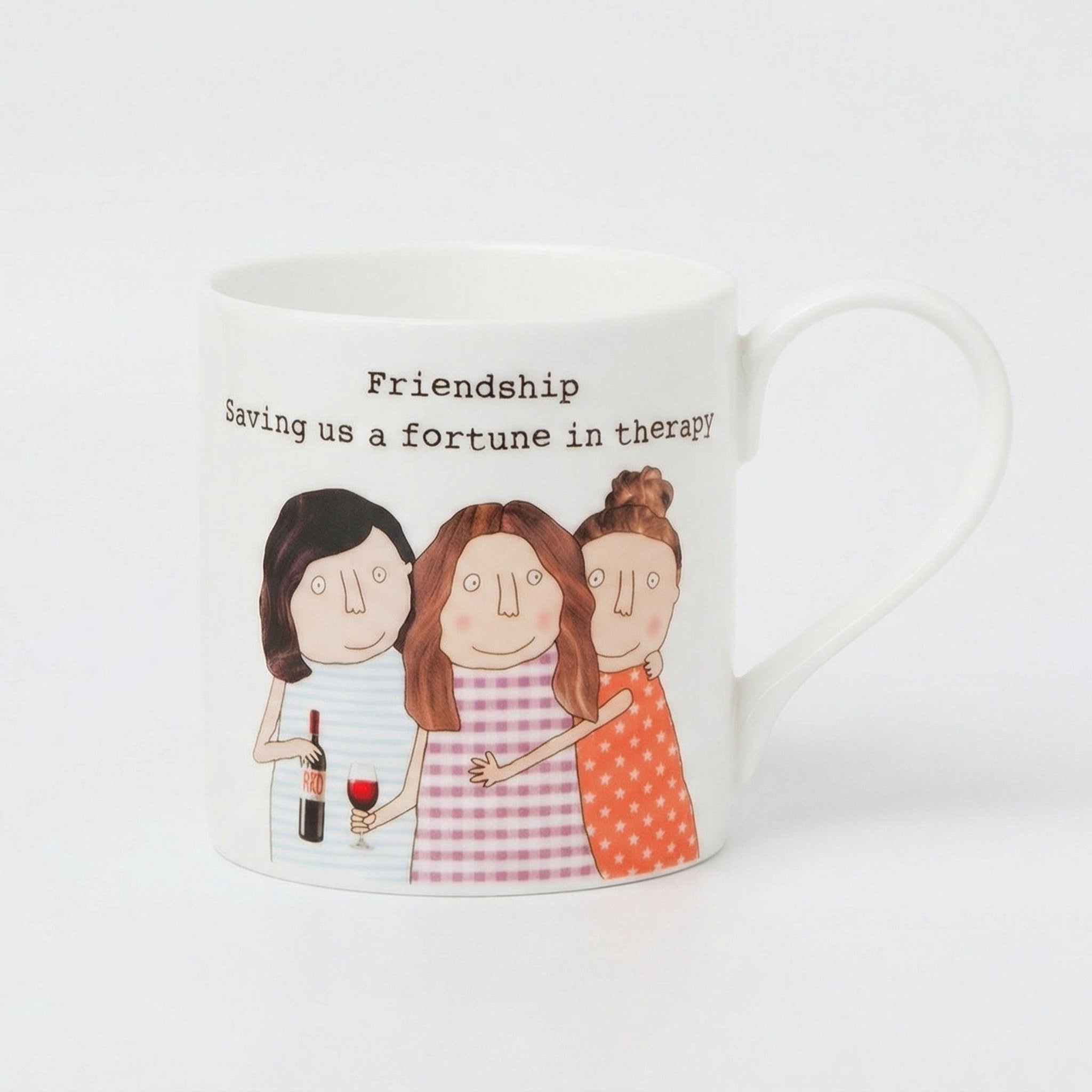 Mug with illustrations of three women and text on a white background