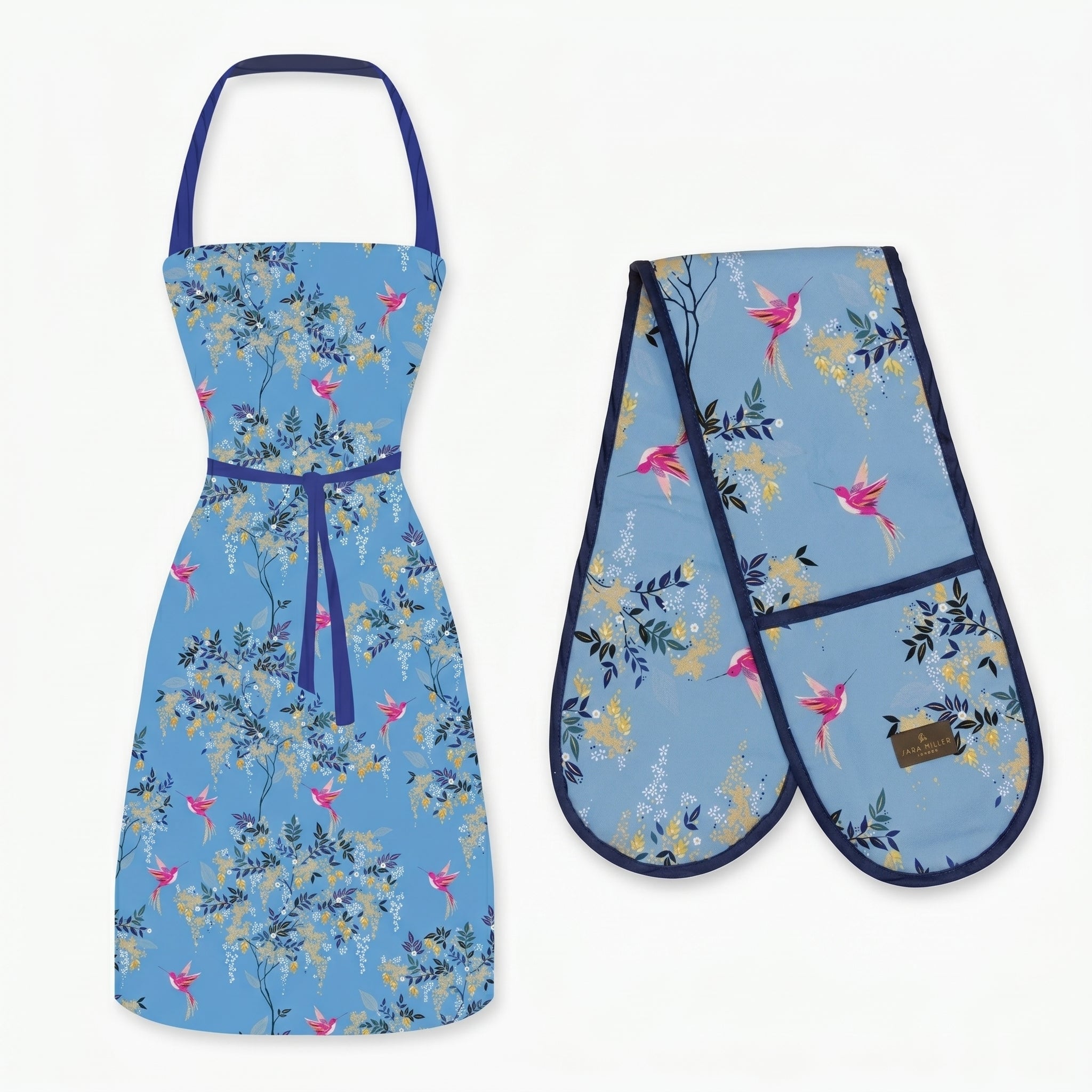 Floral apron and oven mitt set on a white background