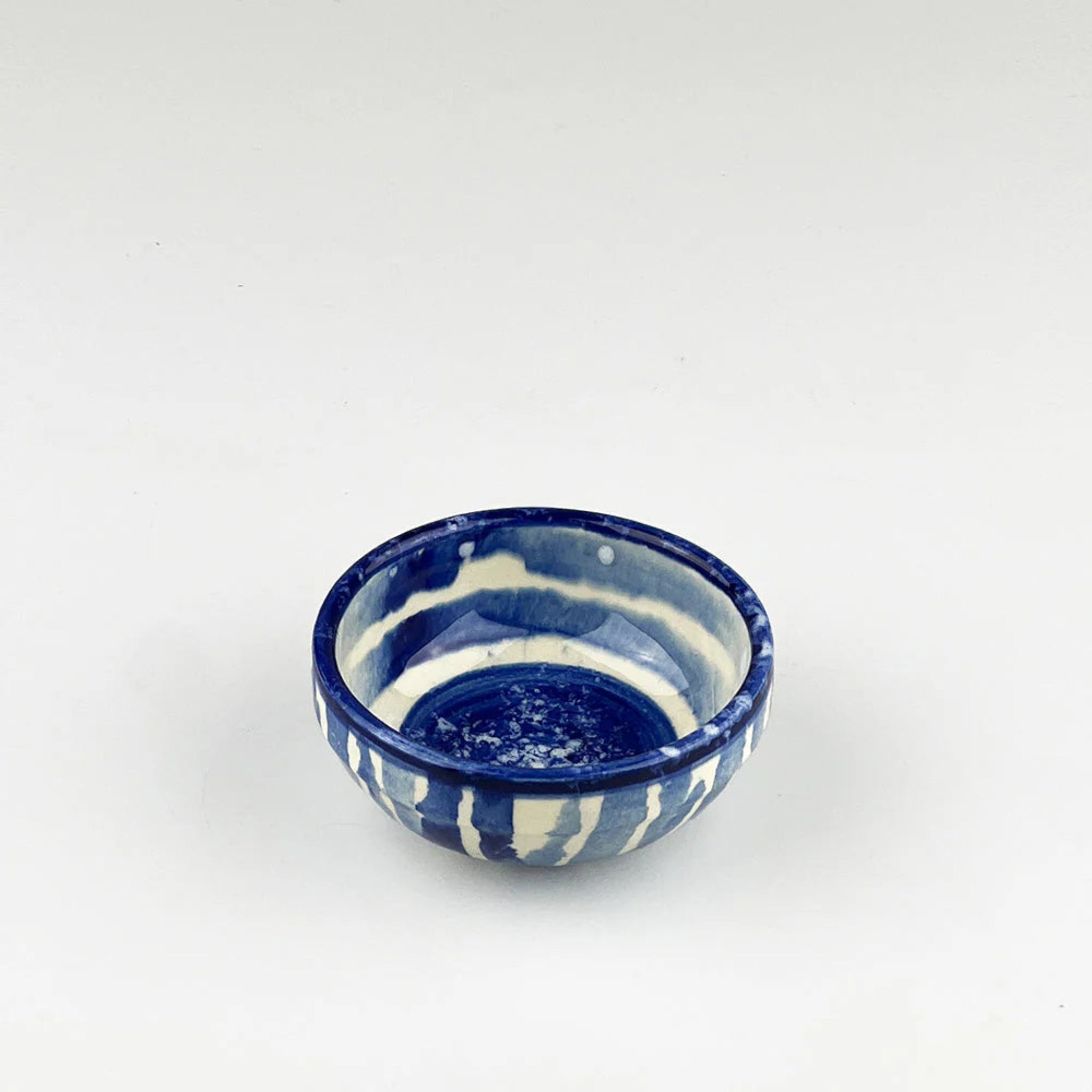 Blue and white ceramic bowl on a white background