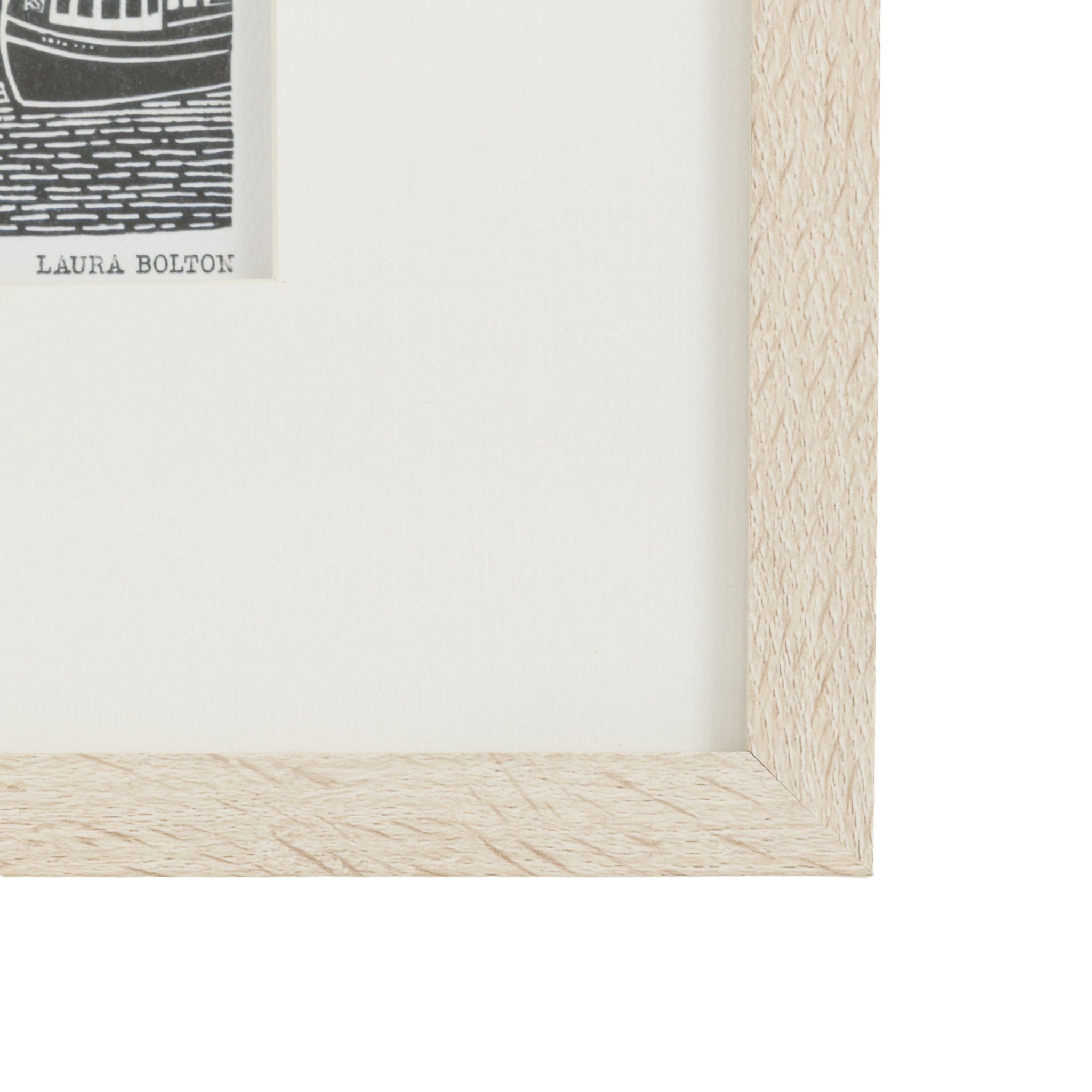 Close-up of a wooden picture frame with &