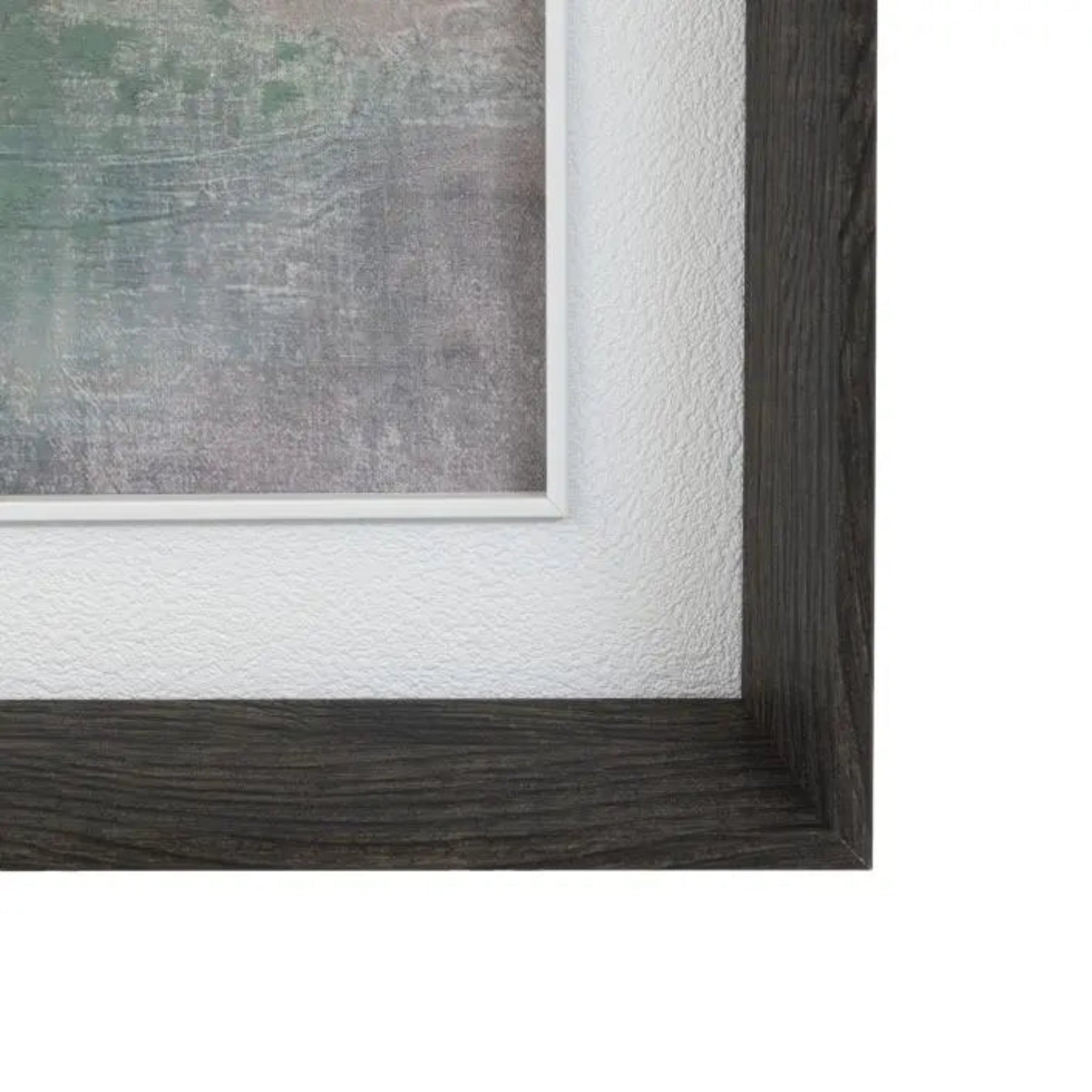 Close-up of a framed painting with a textured white wall background