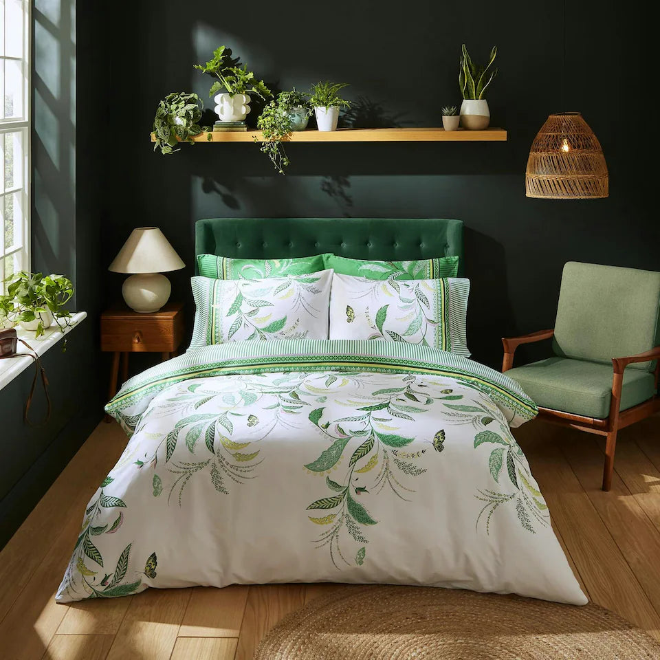 a bedroom with a bed and chair