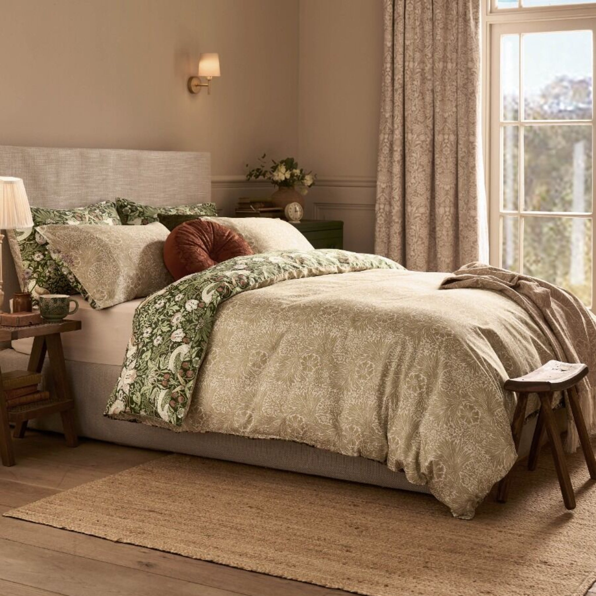 Cozy bedroom with floral bedding and natural light