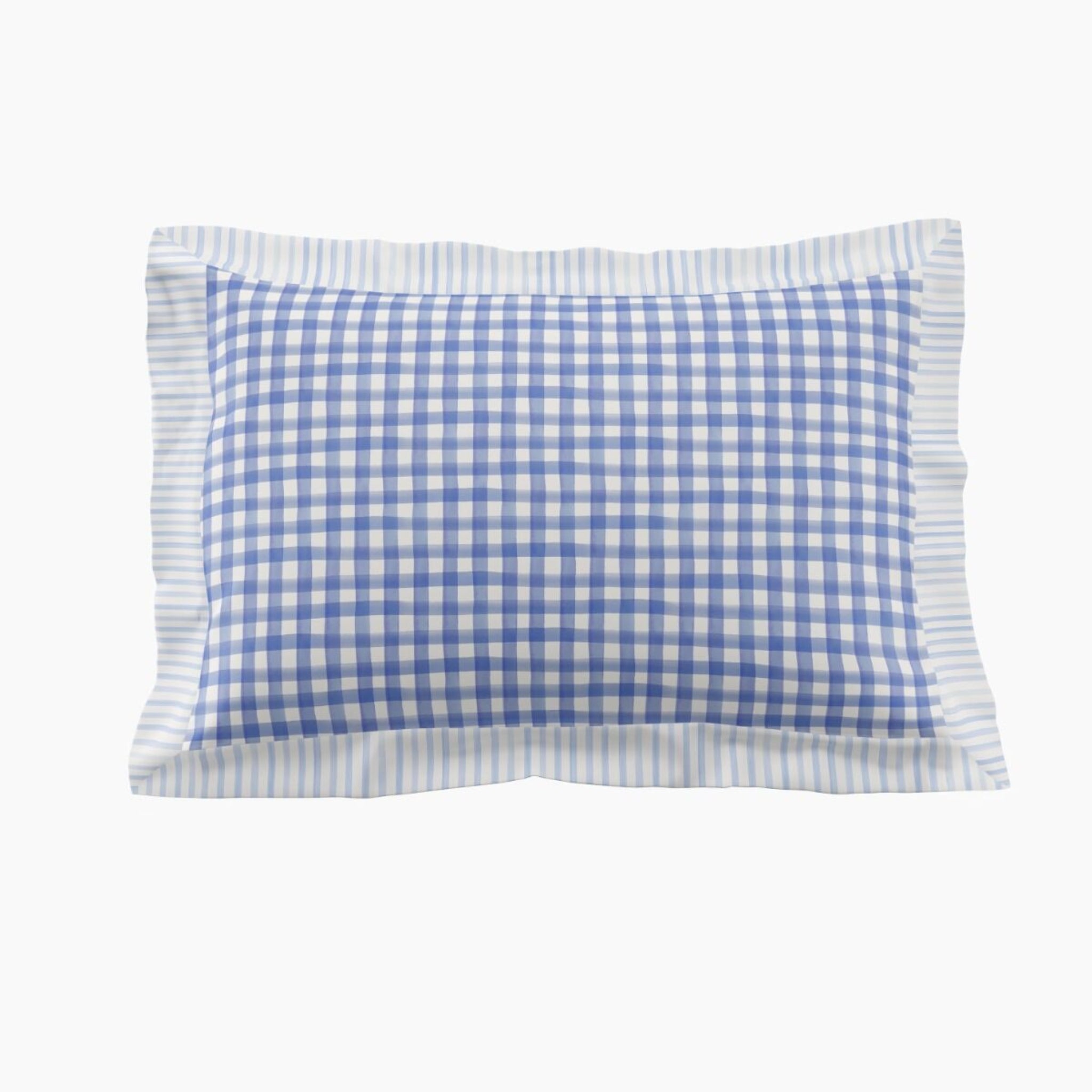 Blue and white checkered pillow on a white background