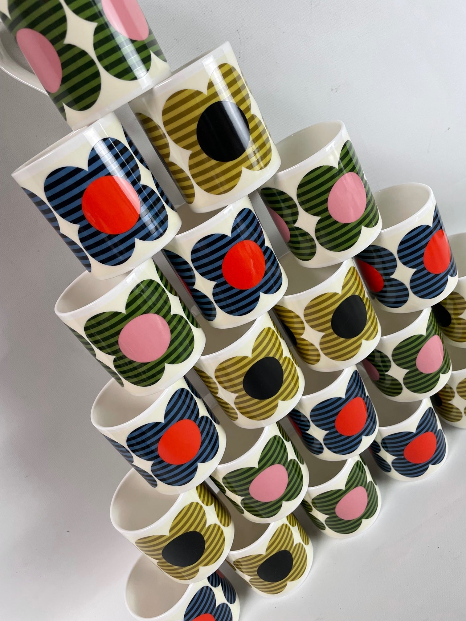 Collection of mugs including Orla Kiely