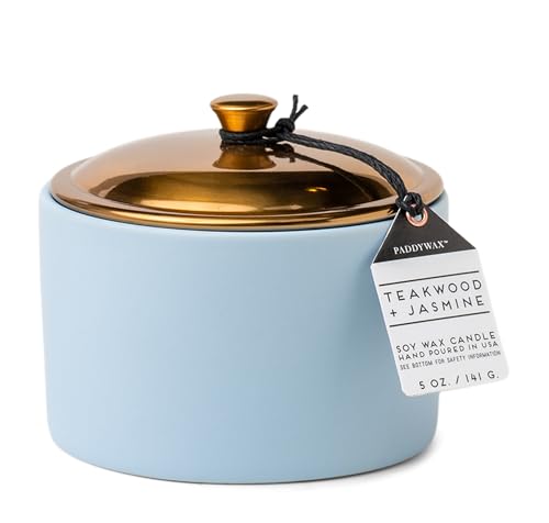 a blue and gold candle
