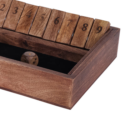 Wooden dice box with numbered compartments on a white background
