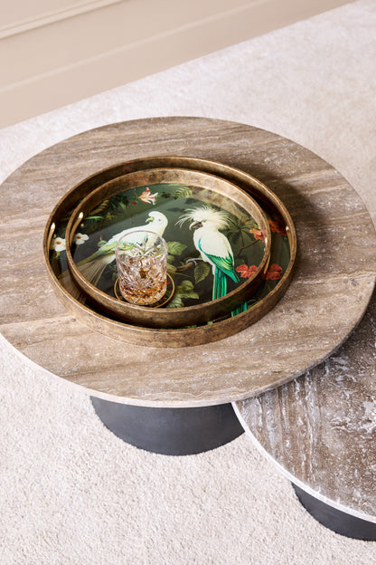 Round wooden table with a decorative inset featuring parrots and a glass vase.