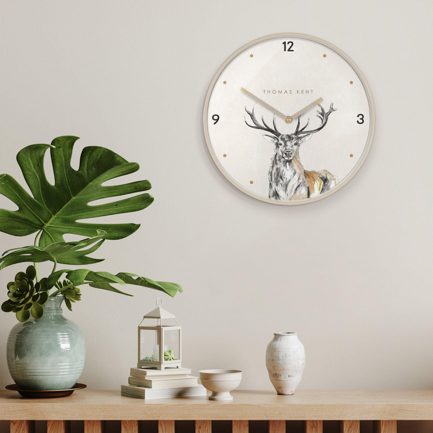 Thomas Kent 12&quot; Wild Stag Wall Clock in Living Room setting