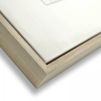 Close-up of a wooden picture frame corner on a white background