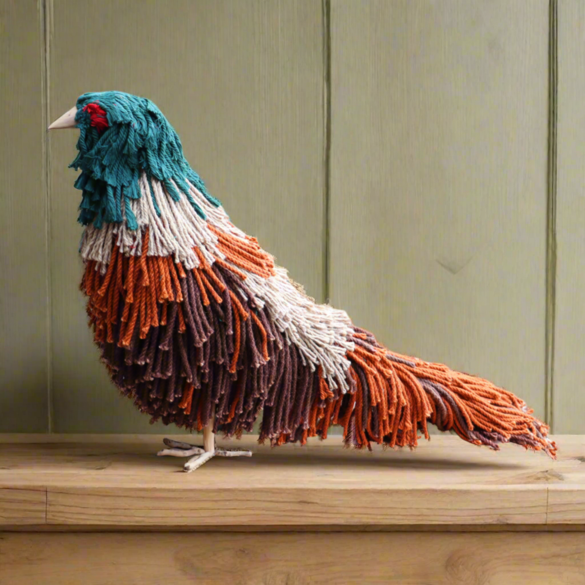 a bird made of yarn