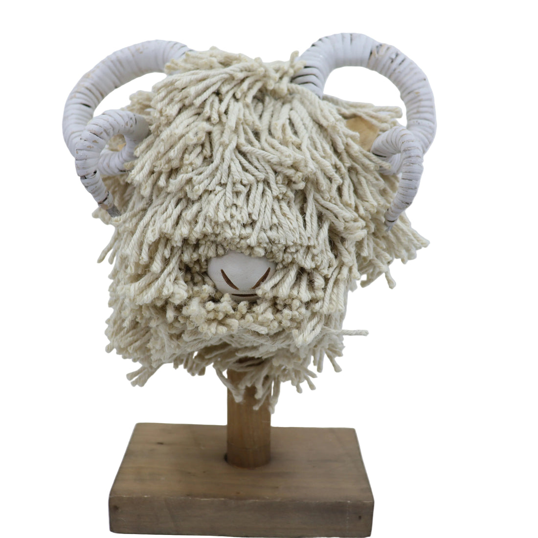 Decorative ram head sculpture with white woolly fleece and wooden base on a white background