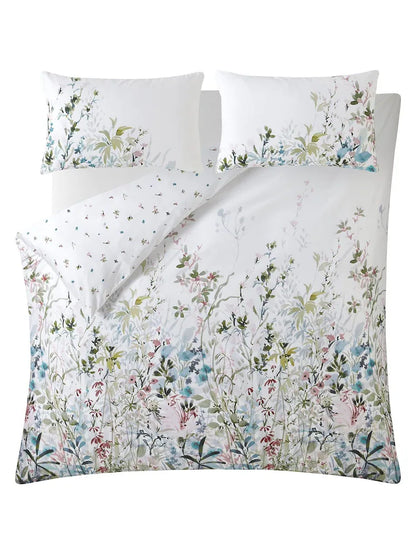 a bed with a floral design