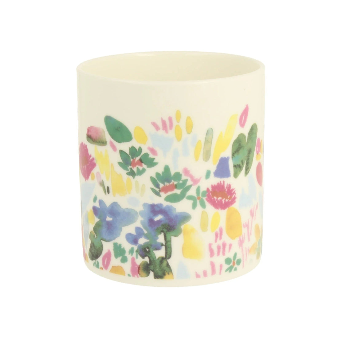 Candle with colorful floral pattern on a white background