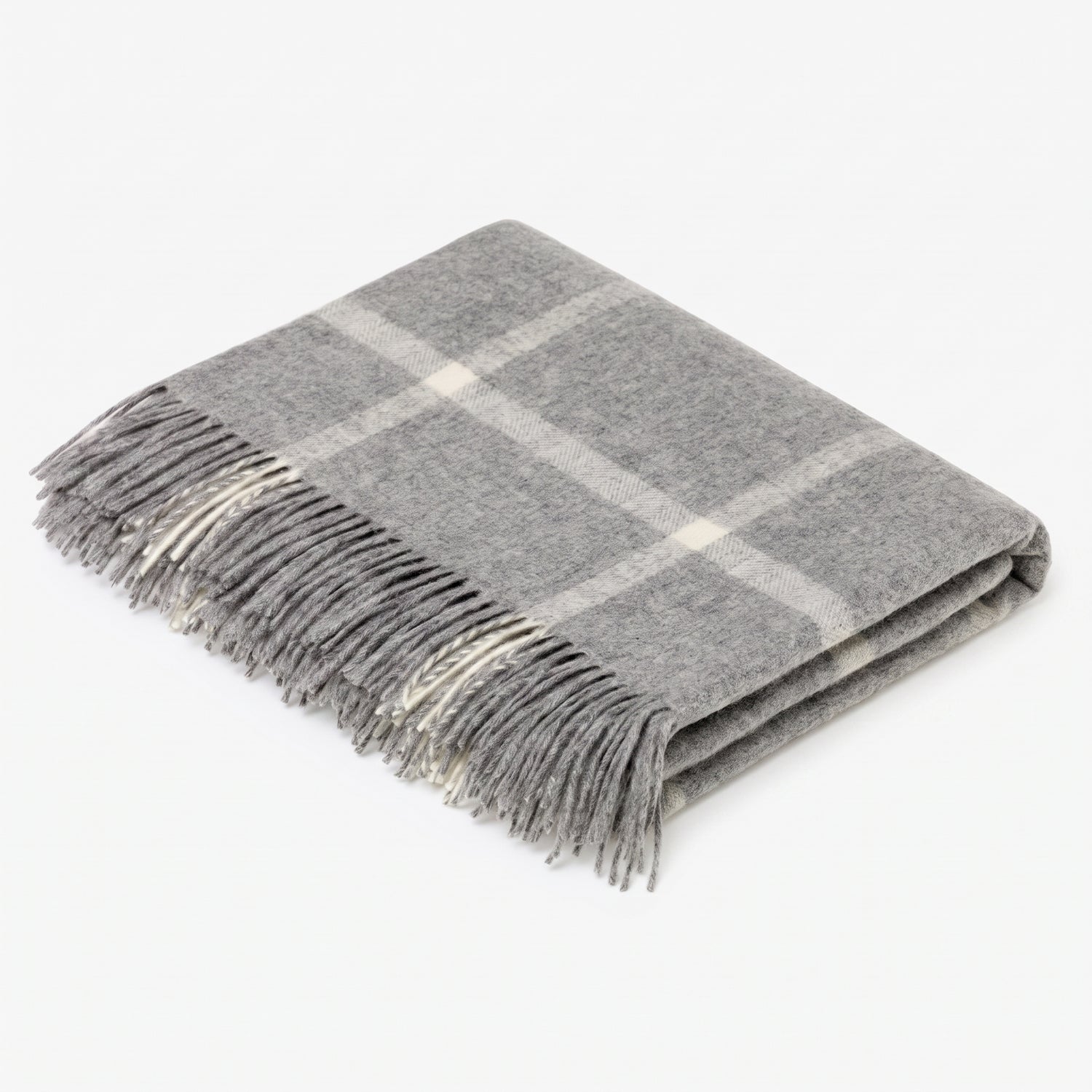 A folded gray plaid throw blanket with fringed edges, displayed on a clean white background.