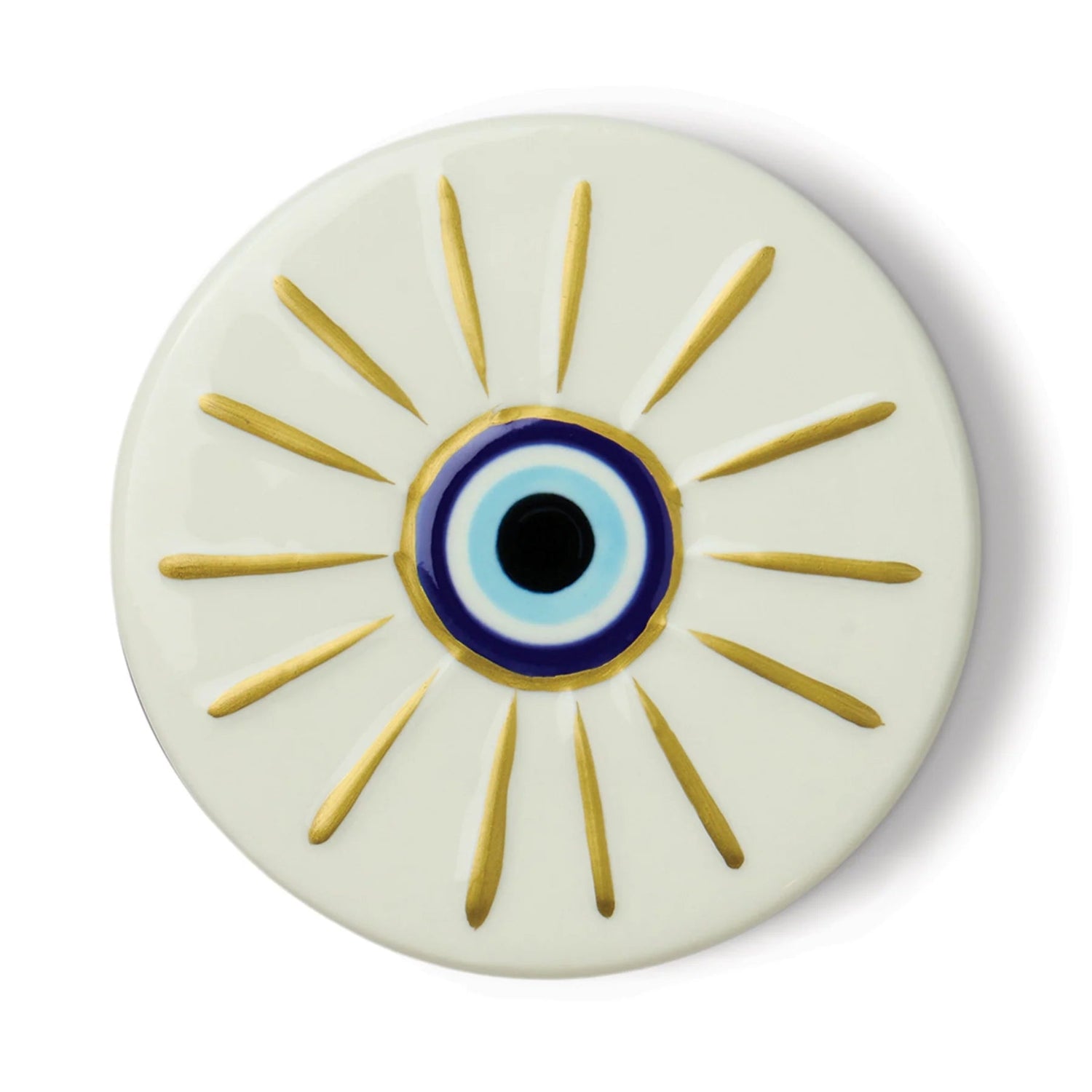 Round ceramic plate with an eye design featuring gold rays on a white background