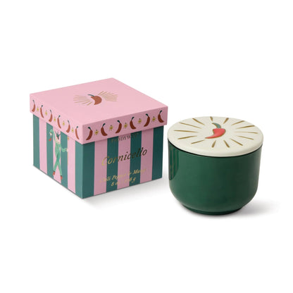 Green ceramic jar with decorative lid and pink striped box on a white background