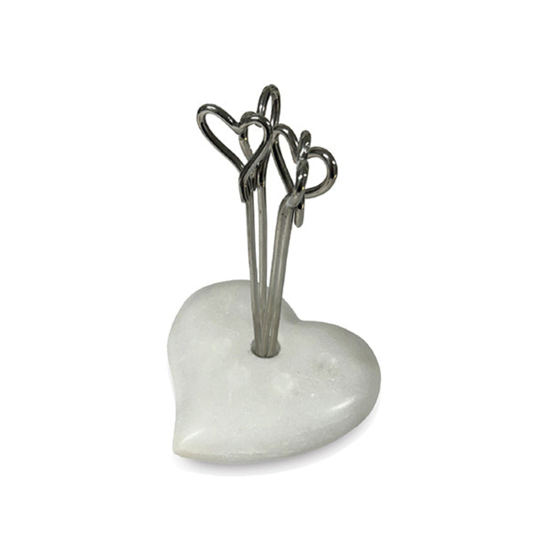 Heart-shaped ceramic holder with metal heart-shaped sticks on a white background