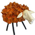 Decorative sheep sculpture with orange fleece on a white background