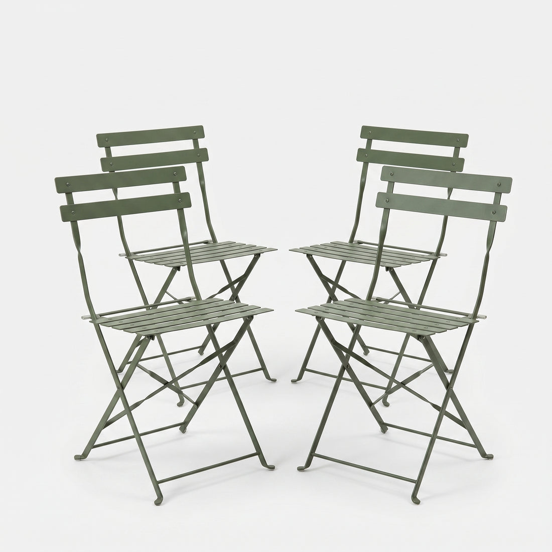 Set of four green folding chairs on a white background