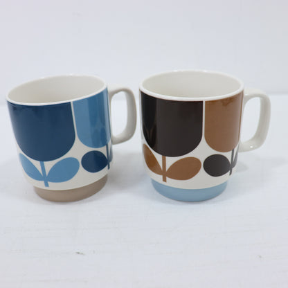 two cups on a white surface