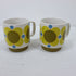 two cups with a pattern on them