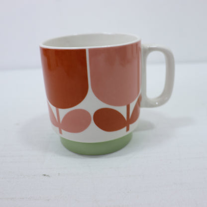 a coffee cup with a white handle