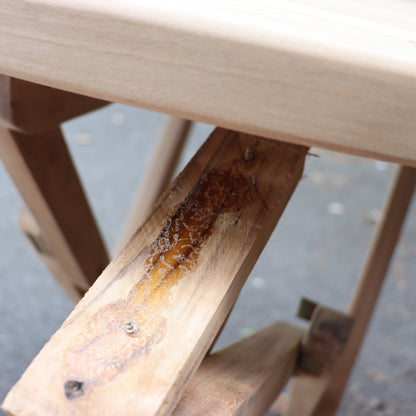 a wood plank with a stain on it