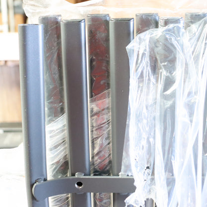 a metal bar with plastic wrap around it