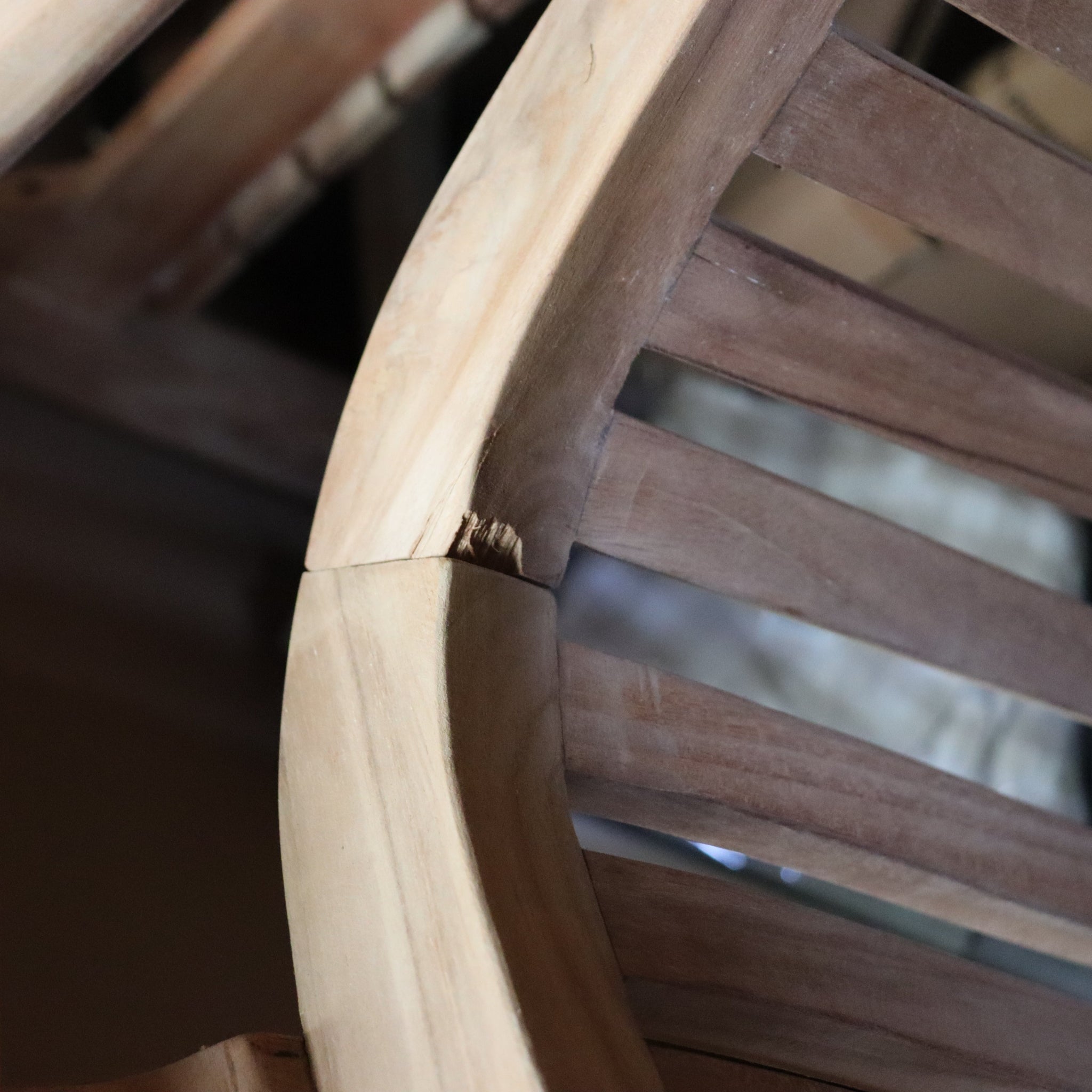 a close up of a wooden chair