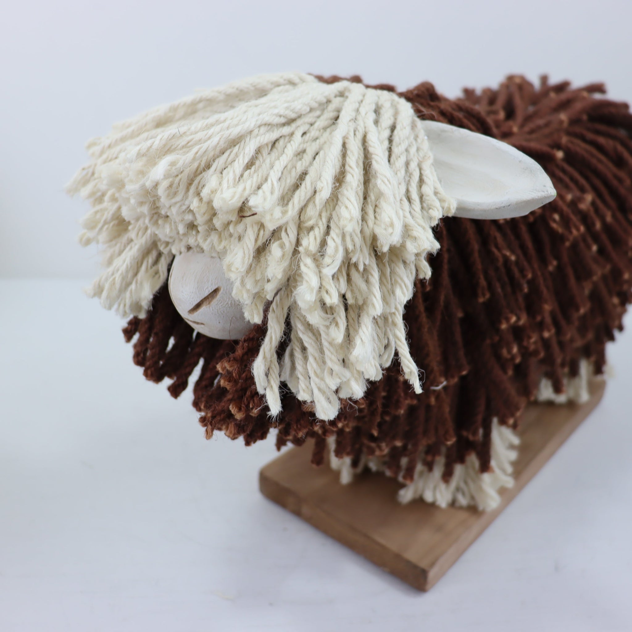 Aquarelle Home Sadie sheep close up. cream face brown body