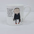 a white mug with a cartoon character on it