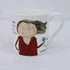 a white mug with a cartoon character on it