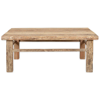 Wooden coffee table on a white background