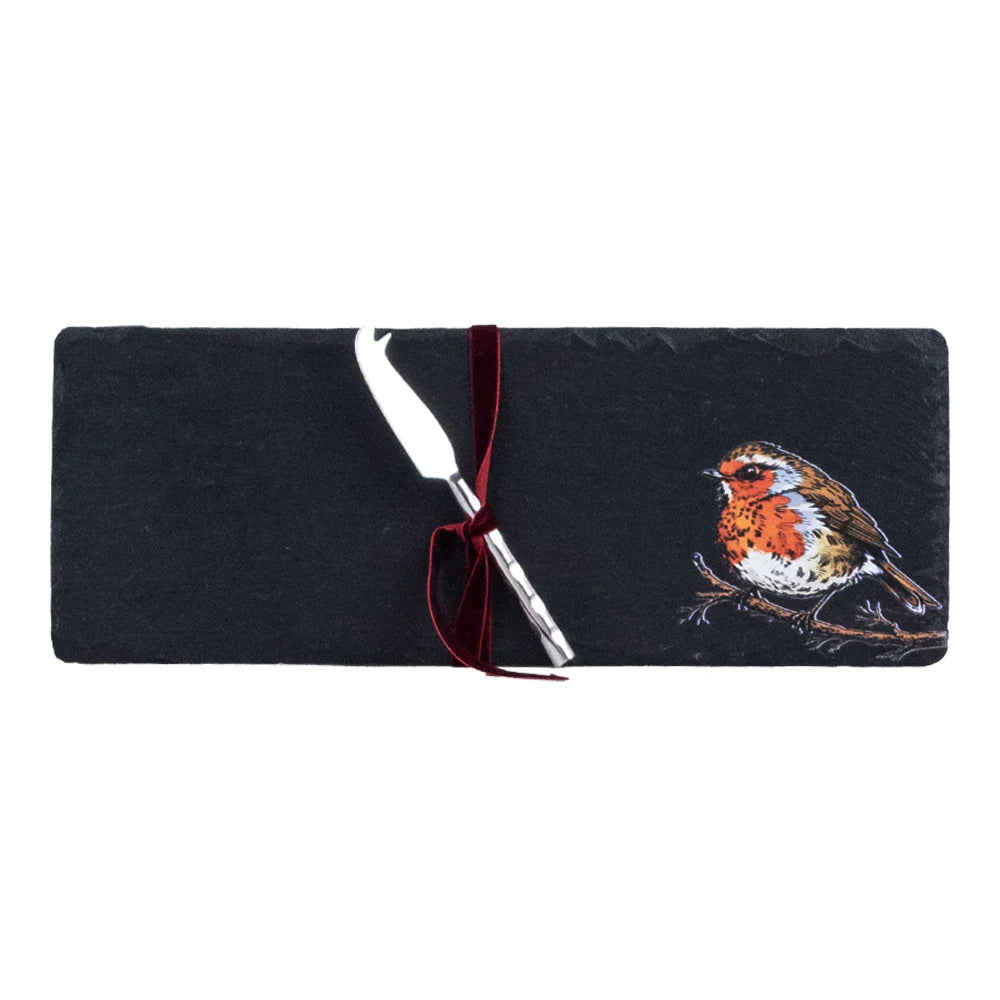 a black rectangular plate with a silver pen and a picture of a bird on it