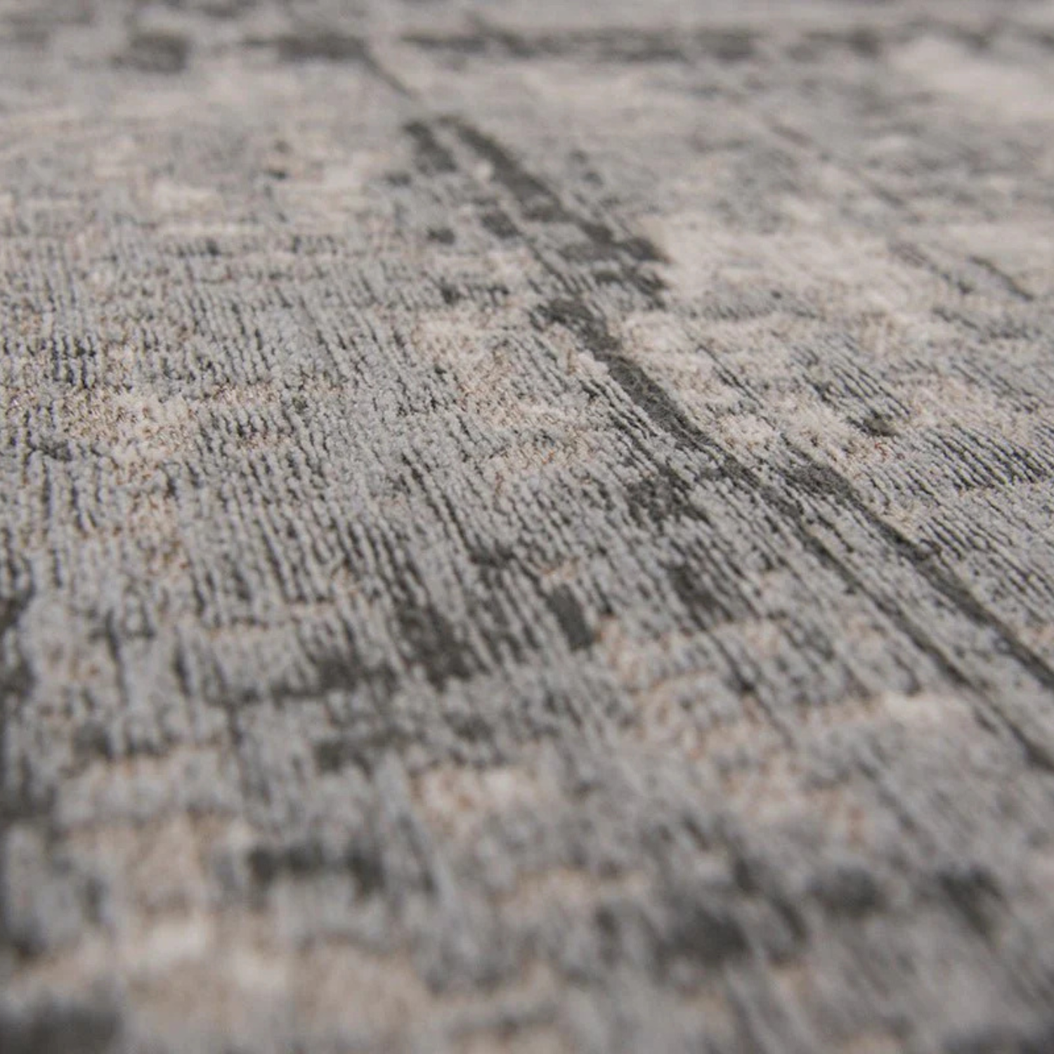 a close up of a grey carpet