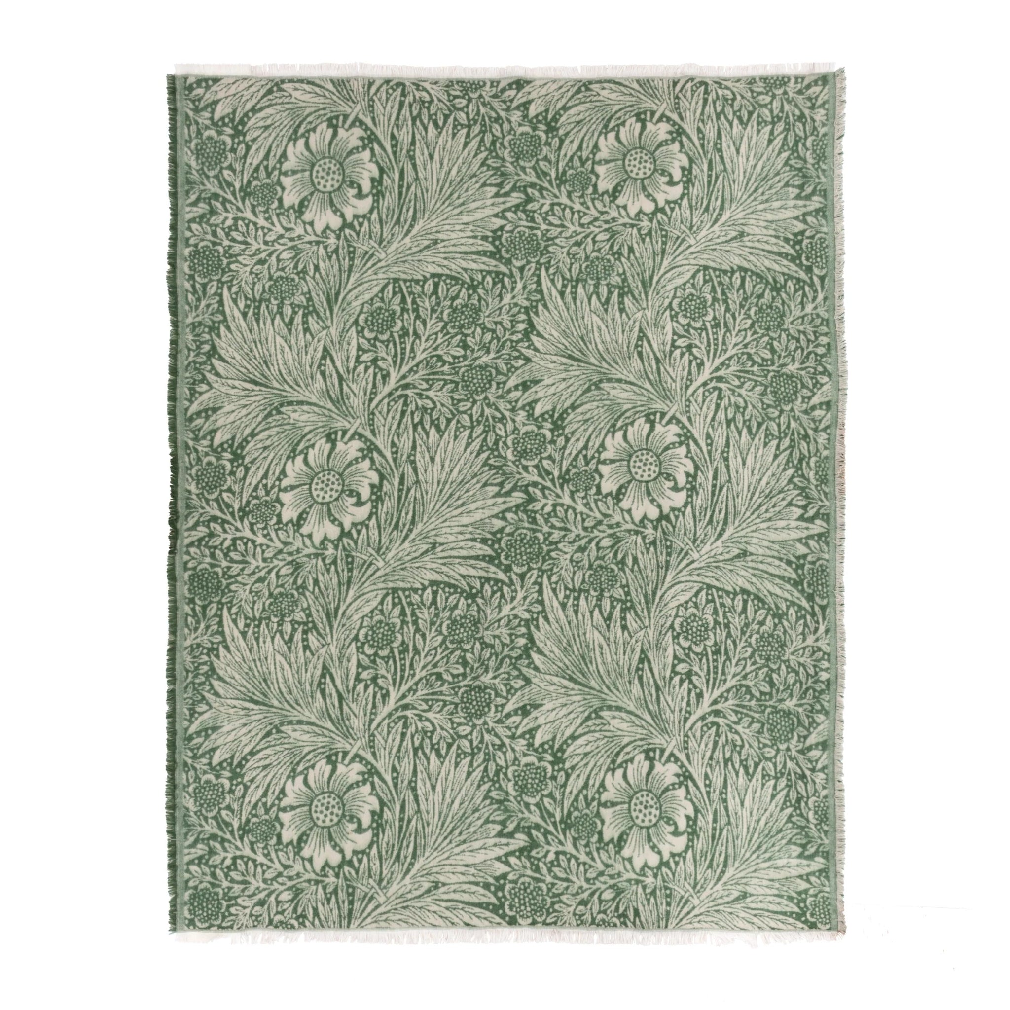 Floral patterned rug with green leaves and flowers on a white background