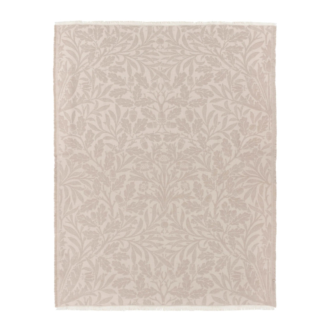 Beige area rug with subtle leaf pattern on a white background