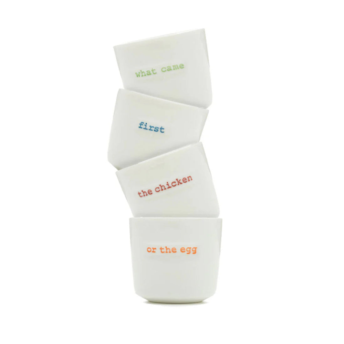 Stack of white ceramic eggs with text on a white background