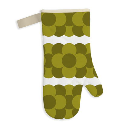 a green and white oven mitt